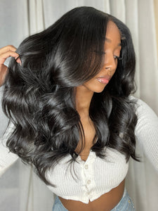 Glueless jet black virgin human hair wig very full with layers. 